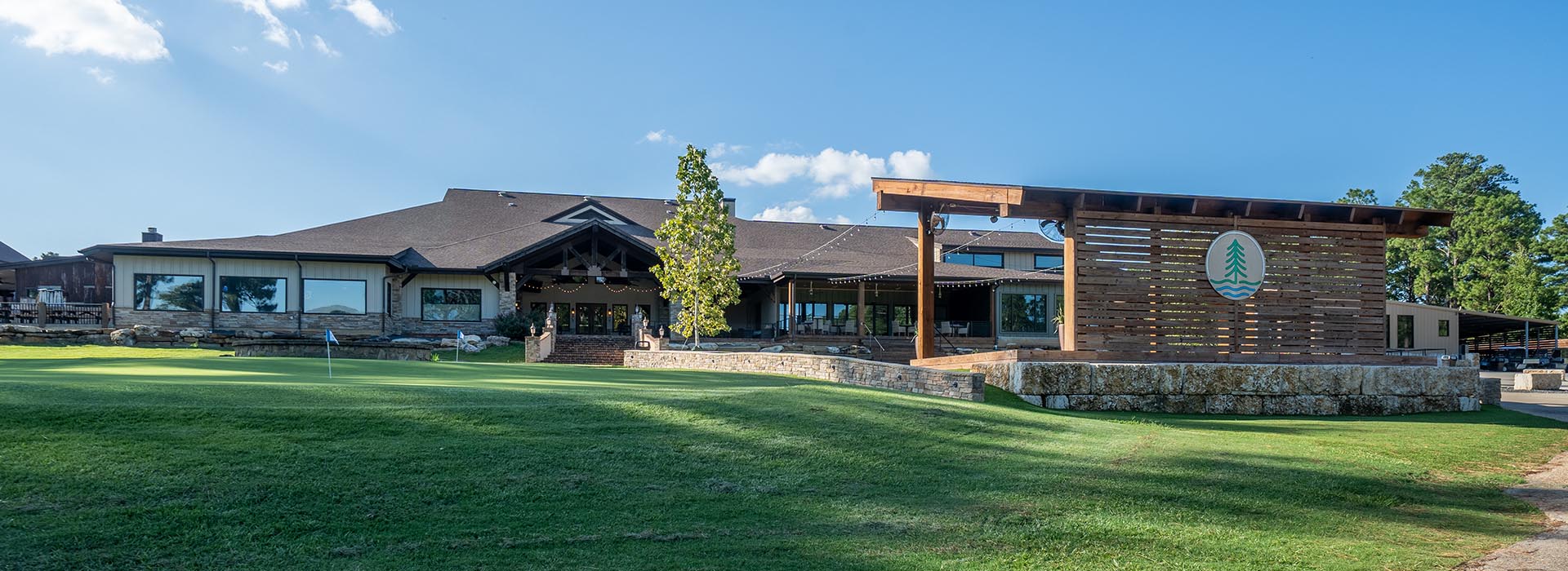 The Lawn at Rayburn Resort with clubhouse in the background